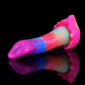 A vibrant, colorful vibrator resting on a sleek black surface, showcasing its playful design and bold hues.