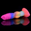 A playful fantasy dildo adorned with a rainbow-colored head, emphasizing a bright and cheerful aesthetic for intimate moments.