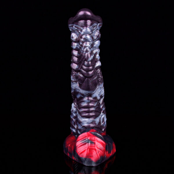 A close-up shot of a black and red monster dildo, showcasing its ridges and texture.