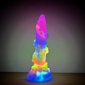 A vibrant, illuminated tentacle dildo radiating colors, showcasing intricate details and a magical aura.