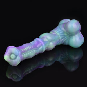 A realistic horse dildo on a black surface. The dildo is green and purple, and features a big knot on its shaft and two balls.